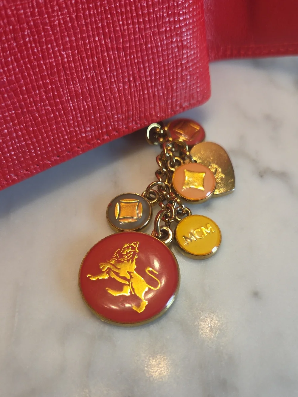 EUC Customized MCM Red Leather Compact Trifold Wallet with Gold Logo Charm ❤️🩷❤